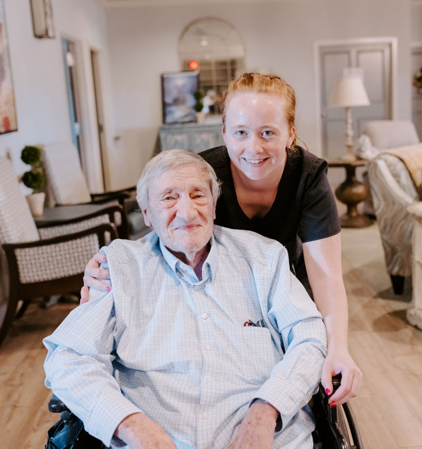 Elder with Staff Member at Green House Cottages of Homewood